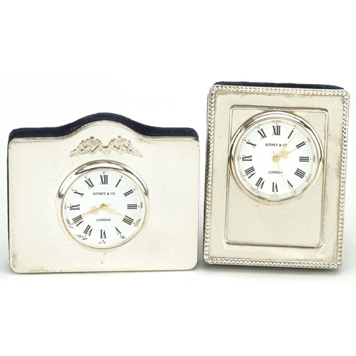 575 - Kitney & Co, two silver easel clocks with boxes, London 1995, the largest 7.5cm high.