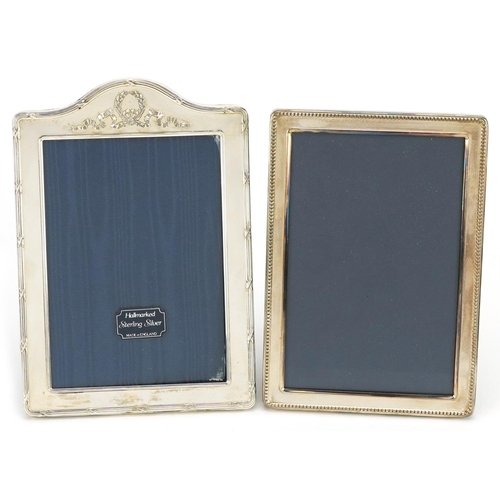 594 - Two rectangular silver easel photo frames with boxes by Carrs and Kitney & Co, London 1991 and Sheff... 