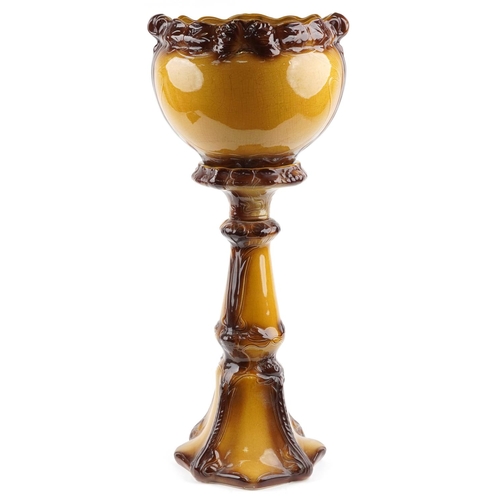 1394 - An early 20th century Art Nouveau style pottery jardinière and stand, 93cm high x 35cm in diameter.