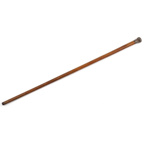 220 - A 19th century malacca walking cane with silver reeded pommel, 87cm in length.