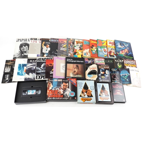 2311 - Film and TV memorabilia including Batman, Jurasic Park, Clockwork Orange VHS, Jaws by Peter Benchley... 