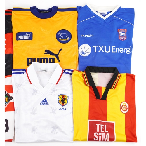 2344 - A collection of football T shirts including Reebok Aston Villa, Umbro Chelsea Football Club, Puma SS... 