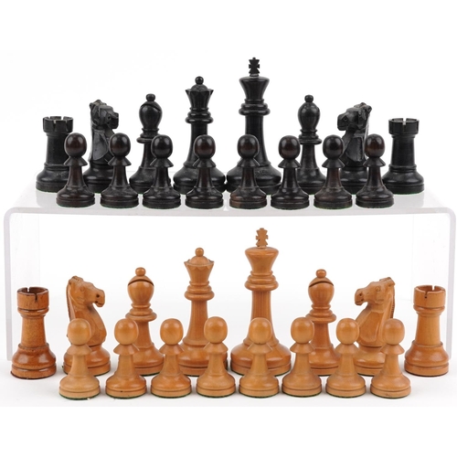 1244 - A boxwood and ebony Staunton pattern chess set with weighted bases housed in a Staunton box, the lar... 