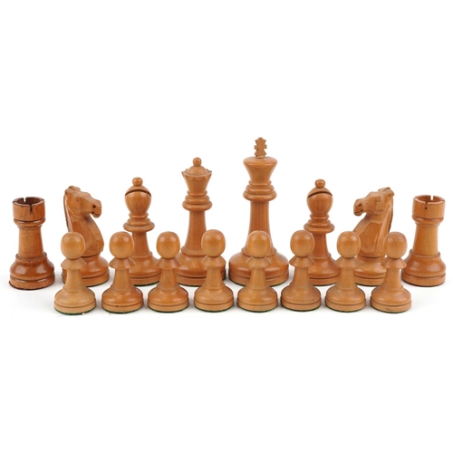 1244 - A boxwood and ebony Staunton pattern chess set with weighted bases housed in a Staunton box, the lar... 