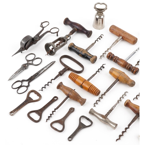 305 - 19th century and later corkscrews, bottle openers, candlesnuffers and scissors.