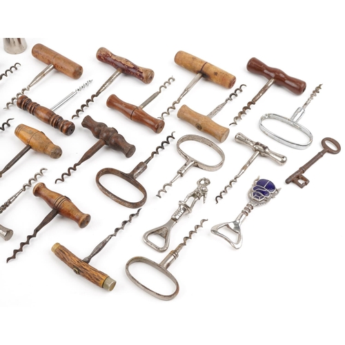 305 - 19th century and later corkscrews, bottle openers, candlesnuffers and scissors.