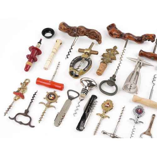 306 - 19th century and later corkscrews and bottle openers.