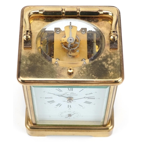 63 - An early 20th century gilt brass cased repeating carriage clock by L'Epee Saint Luxanne France, the ... 