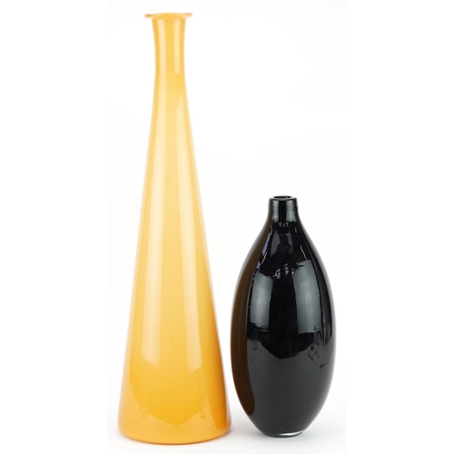 1410 - A large mid 20th century yellow art glass vase, 51cm high, together with a black art glass vase, 29c... 