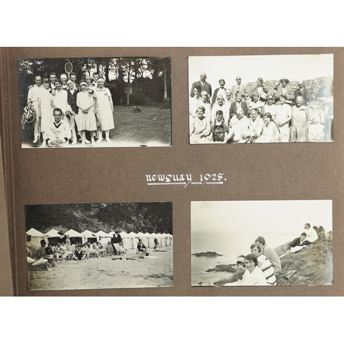 2321 - An early 20th century photograph album containing black and white holiday photographs from around th... 