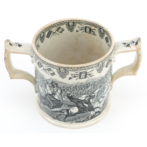  A mid Victorian Staffordshire pottery two handled mug decorated with scenes from the Crimean War, 11... 