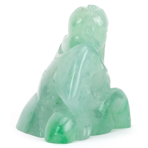 276 - A Chinese carved green jade study of a seated elder, 5cm wide, 65.8g