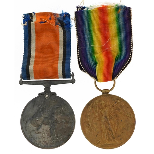 2408 - A British military World War I medal pair awarded to 26139 PTE.T.F.DRAPER.WILTS.R..