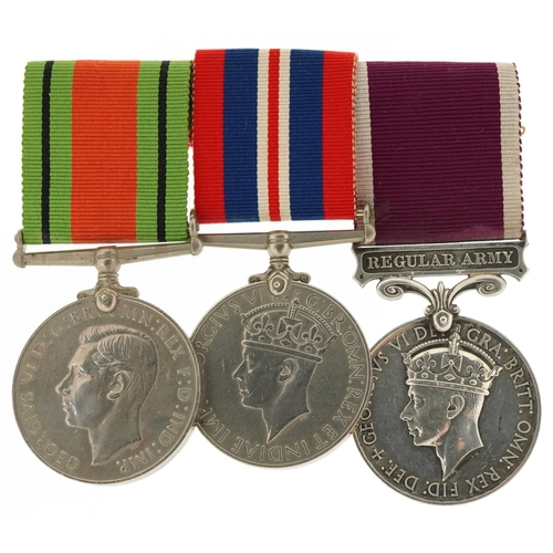 2427 - Three British military World War II medals with bar including a Regular Army medal awarded to 840138... 