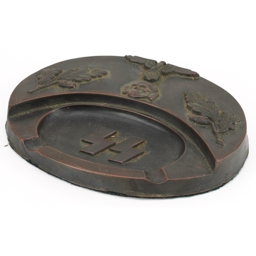 2575 - A German military interest bronzed SS desk stand, 19cm wide.