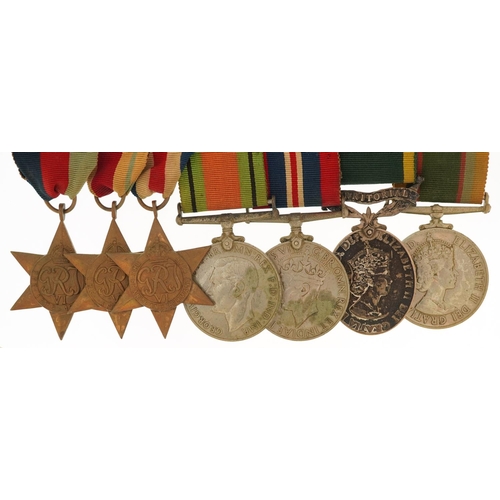  A British military World War II medal group including Territorial Efficient Service medal awarded to... 