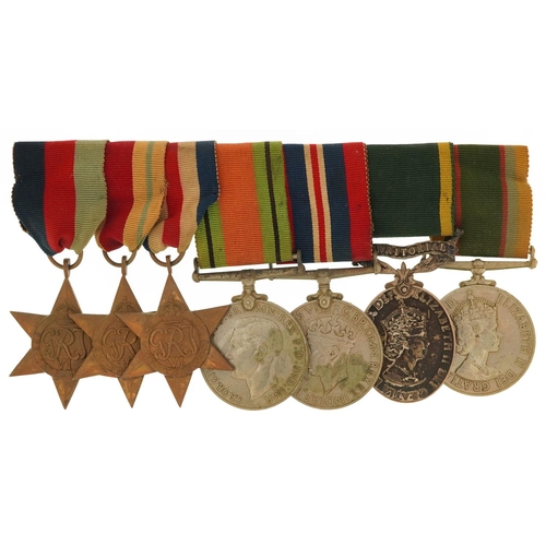  A British military World War II medal group including Territorial Efficient Service medal awarded to... 