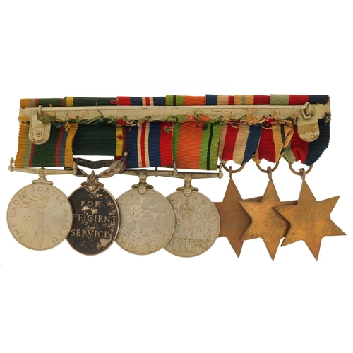  A British military World War II medal group including Territorial Efficient Service medal awarded to... 