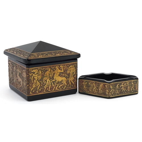 27 - A Moser amethyst glass box and cover and a similar ashtray with gilded gold frieze, signed to the ba... 