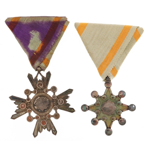 2489 - Two Japanese military interest medals including Order of the Sacred Treasure 5th Class, with boxes.