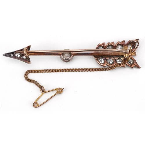 3001 - A good antique unmarked gold diamond bar brooch in the form of an arrow set with thirteen diamonds, ... 