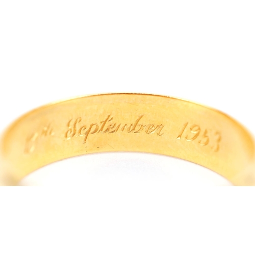 3018 - A 22ct gold wedding band, size T, 5.9g.