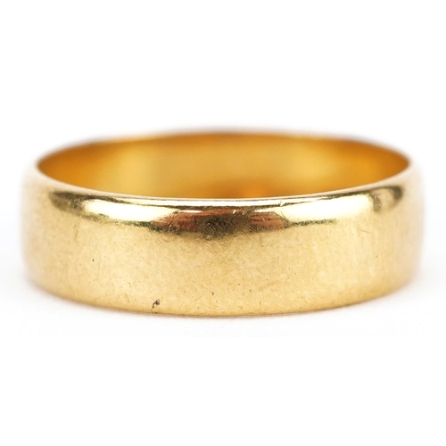 3018 - A 22ct gold wedding band, size T, 5.9g.