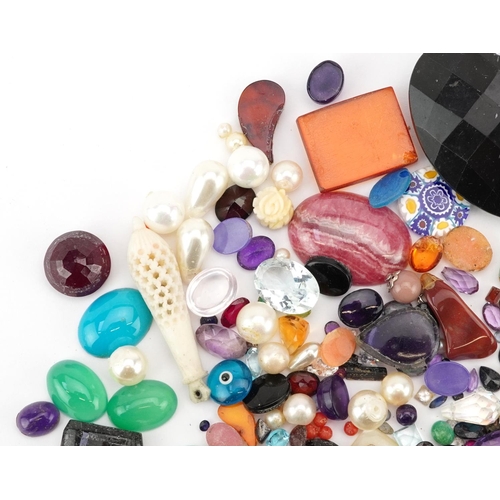 3326 - A large collection of loose semi precious stones and beads including amethyst, citrine, jade, turquo... 