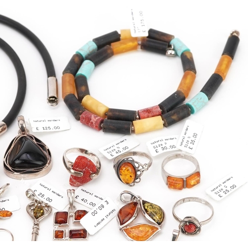 3315 - A large collection of silver mounted amber jewellery, predominantly with Natural Wonders labels incl... 