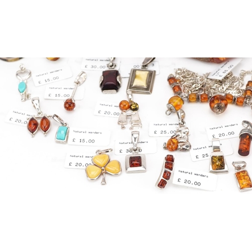 3315 - A large collection of silver mounted amber jewellery, predominantly with Natural Wonders labels incl... 