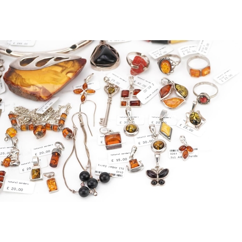 3315 - A large collection of silver mounted amber jewellery, predominantly with Natural Wonders labels incl... 