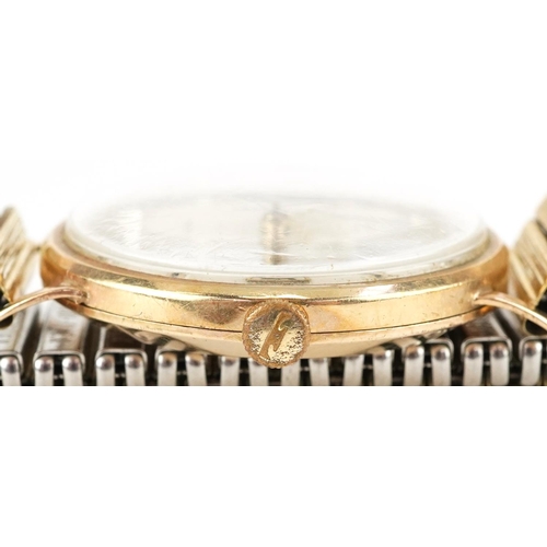 3021 - Avia, gentlemen's 9ct gold cased wristwatch having silvered dial with date aperture on a gold plated... 