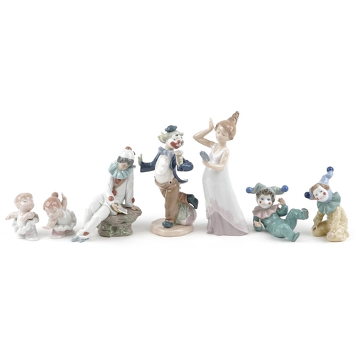 1221 - Seven Nao porcelain figures including three clowns, a Pierrot and a young girl with hand mirror, thr... 