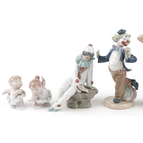 1221 - Seven Nao porcelain figures including three clowns, a Pierrot and a young girl with hand mirror, thr... 