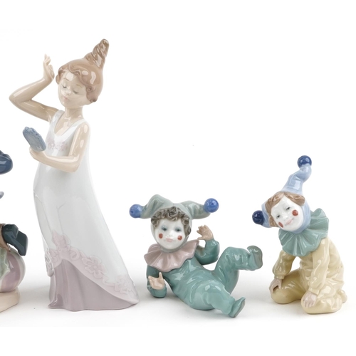 1221 - Seven Nao porcelain figures including three clowns, a Pierrot and a young girl with hand mirror, thr... 