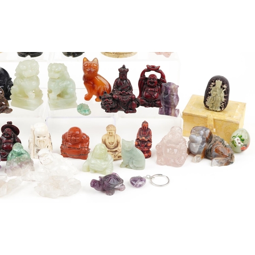 1521 - A collection of Asian and Middle Eastern figures and animals including carved Blue John, quartz, ame... 