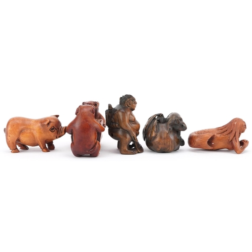 107 - Five Japanese carved wood netsukes including mice holding a basket, mermaid and Sumo wrestler, the l... 