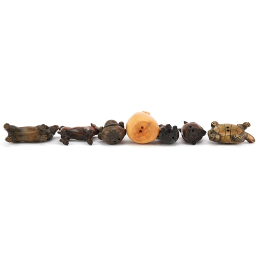 110 - Seven Japanese carved wood netsukes including mouse with corn, tortoise, toad and dogs, the largest ... 