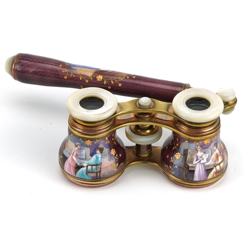  A good pair of French guilloche enamel, brass and mother of pearl opera glasses with telescopic hand... 