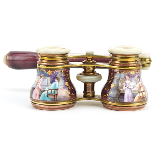 1 - A good pair of French guilloche enamel, brass and mother of pearl opera glasses with telescopic hand... 