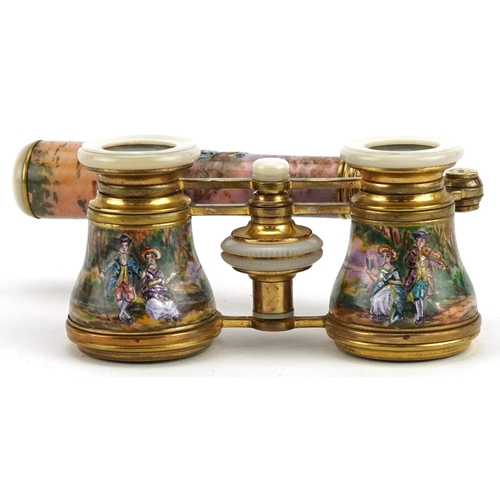 2 - A good pair of French guilloche enamel, brass and mother of pearl opera glasses with telescopic hand... 