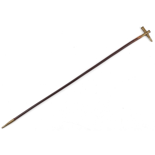 2483 - A military interest swagger stick with trench art shell case handle, 73cm in length.