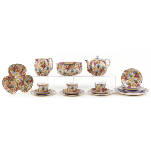 1233 - Royal Winton by Grimwades Chintz pattern teaware including teapot, milk jug, trios and a trefoil dis... 