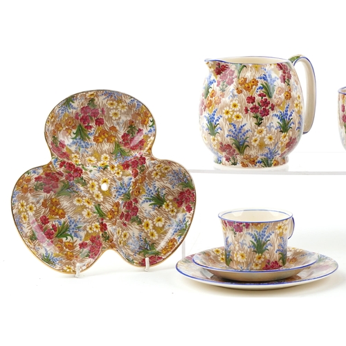 1233 - Royal Winton by Grimwades Chintz pattern teaware including teapot, milk jug, trios and a trefoil dis... 