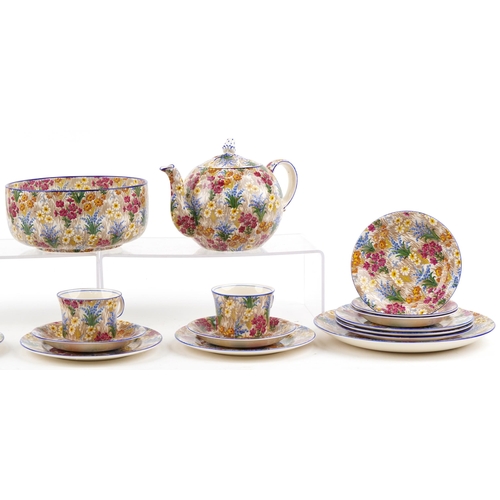 1233 - Royal Winton by Grimwades Chintz pattern teaware including teapot, milk jug, trios and a trefoil dis... 