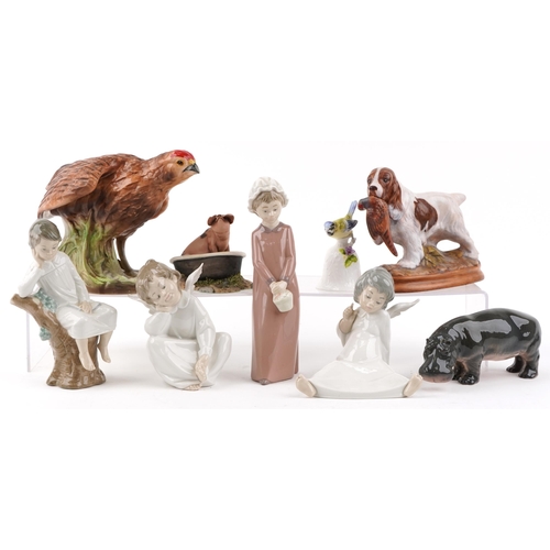 1222 - A collection of Lladro figures and porcelain animals including a Melba Ware grouse and Lladro cherub... 