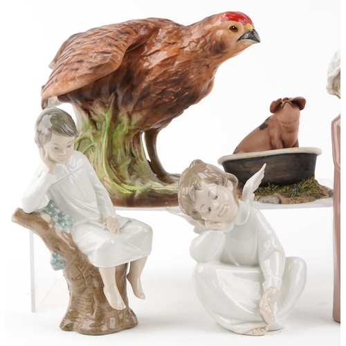 1222 - A collection of Lladro figures and porcelain animals including a Melba Ware grouse and Lladro cherub... 