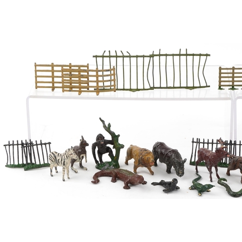 1258 - A collection of antique and later hand painted lead model farmyard animals and accessories including... 