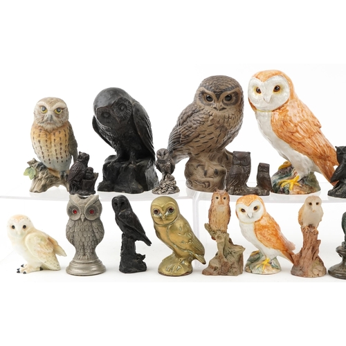 1508 - A large collection of ornamental owls including Beswick, Poole, brass and carved wood, the largest 1... 