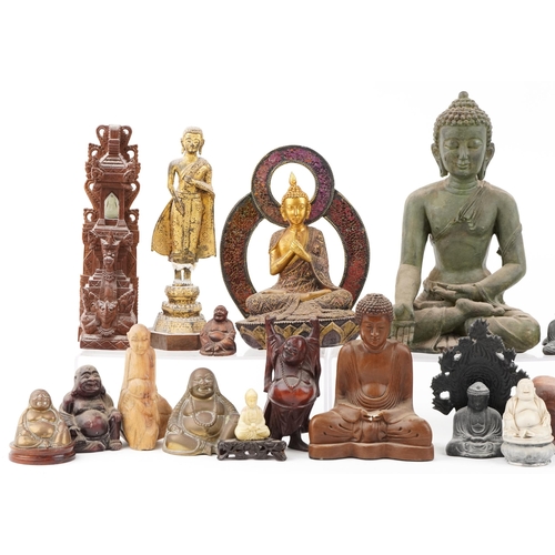 1472 - A collection of Tibetan and Chinese figures of Buddha including carved wood, brass, spelter and carv... 